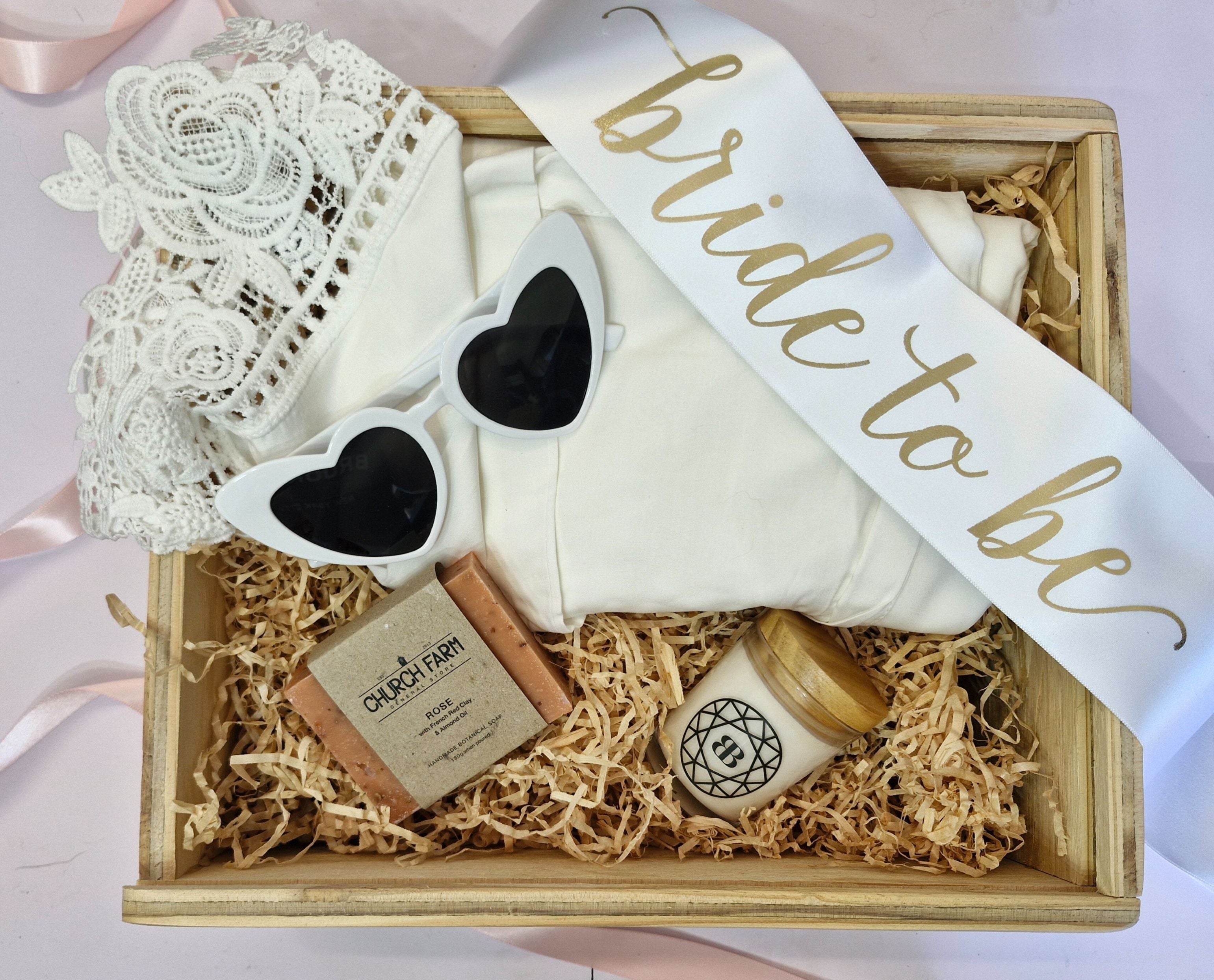 bride hamper with bridal robe, heart sunglasses, soap and candle