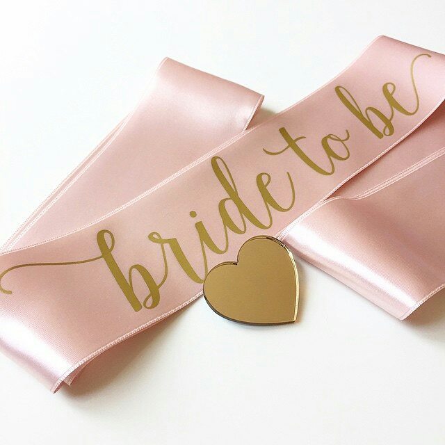 pink and gold bride to be sash with acrylic heart pin