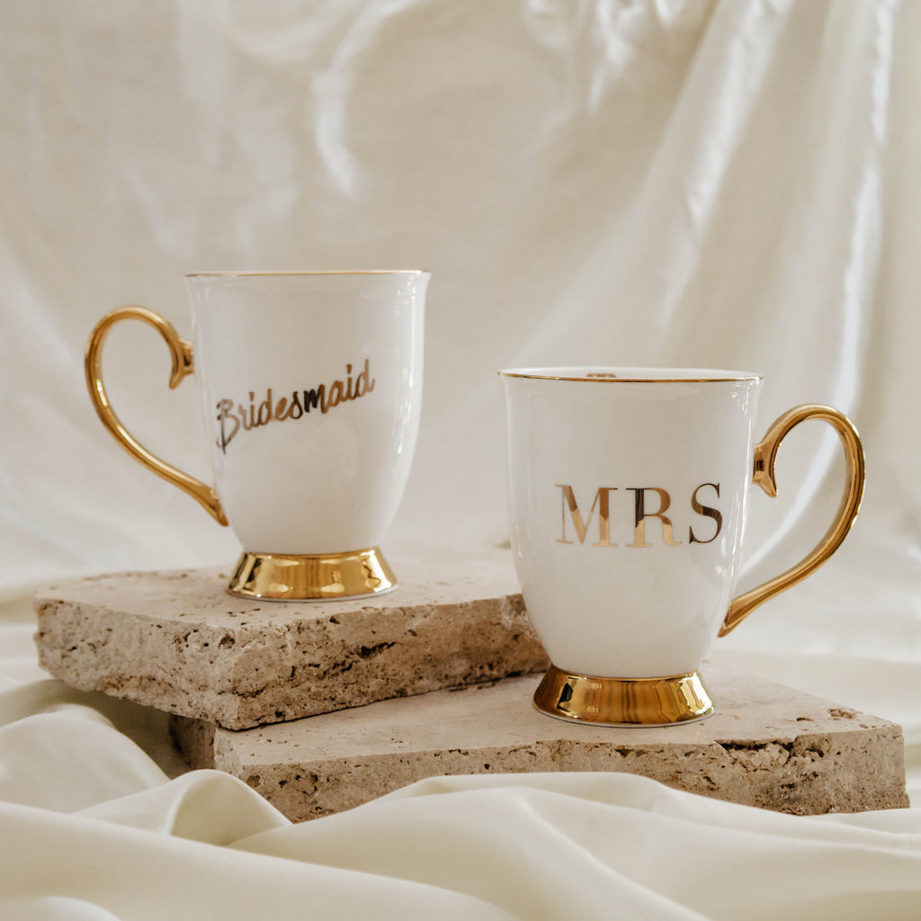 Cristina Re Mugs