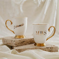 Cristina Re Mugs