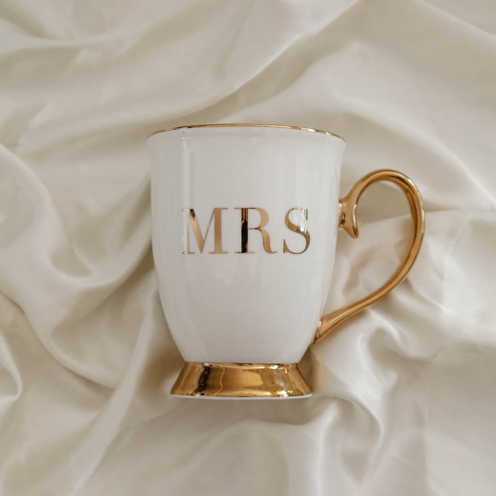 Cristina Re Mugs