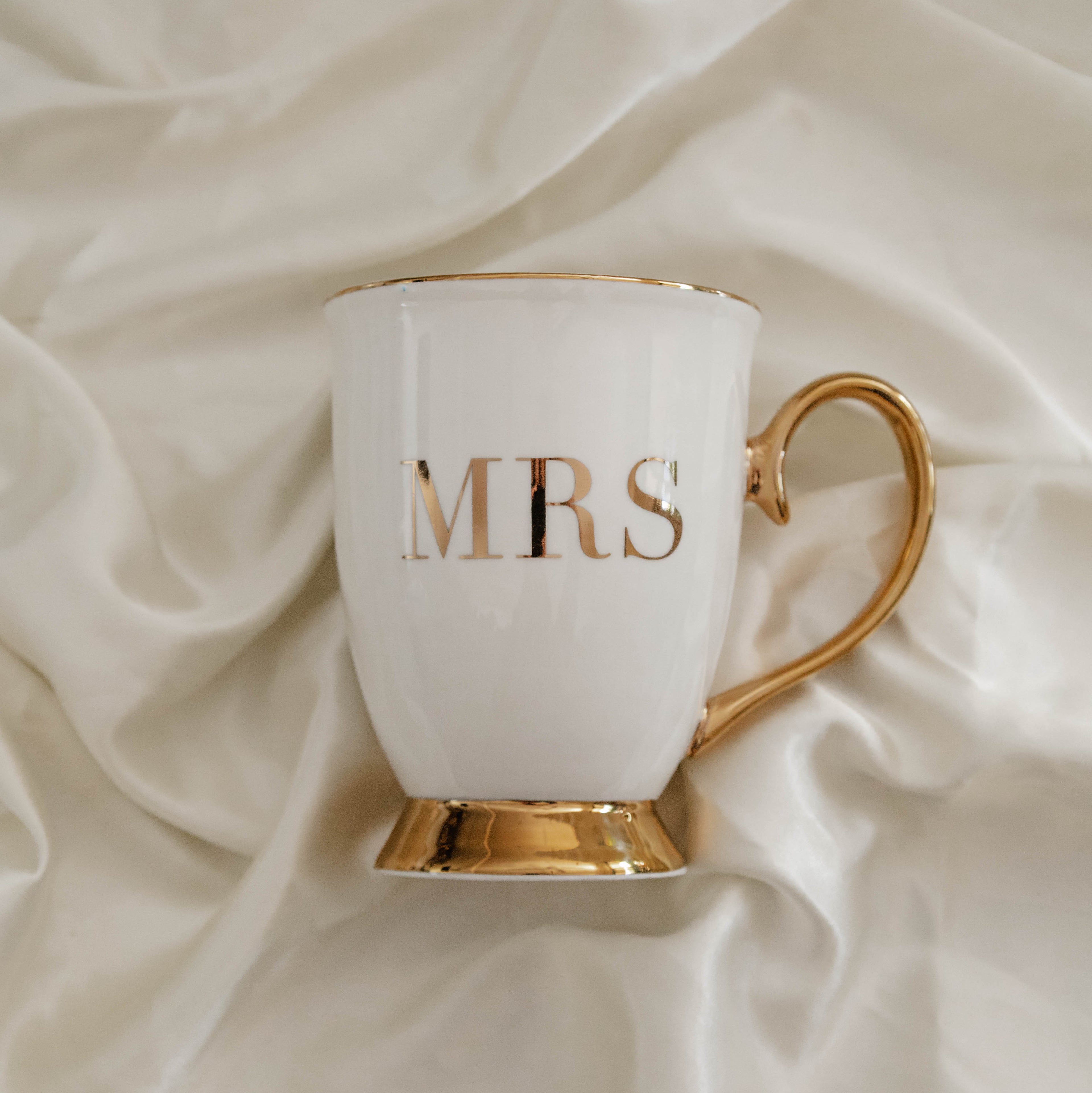 Cristina Re Mugs