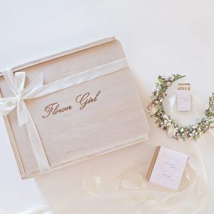 wooden keepsake gift box for flower girl, custom engraved with white ribbon tied in box and a flower crown beside it