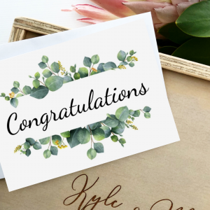 congratulations gift card on top of custom personalised wooden keepsake gift box