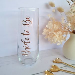 champagne flute personalised to read "bride to Be" in metallic gold acrylic