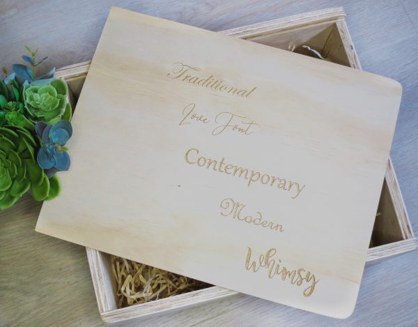 a wooden gift box with our selection of fonts engraved to the lid in their font as an example of the font selection