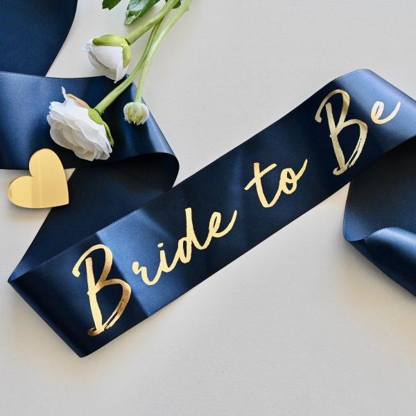 royal blue sash with gold lettering