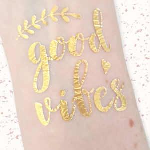 gold foil temporary tattoo reading good vibes hens party bachelorette bridal party