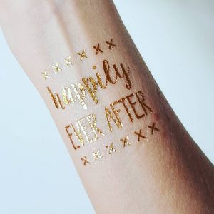 happily ever after temporary gold foil tattoo on wrist
