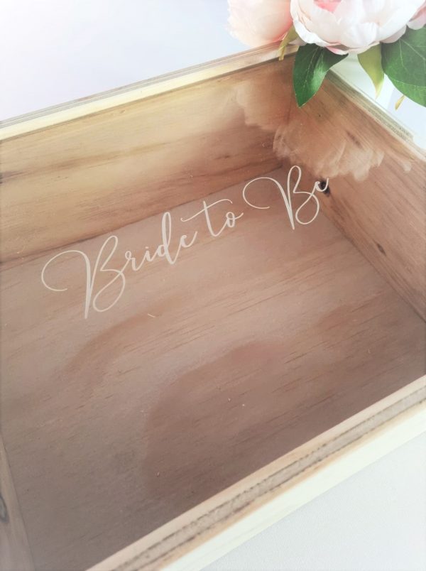 close up of acrylic lid engraving on wooden keepsake gift box