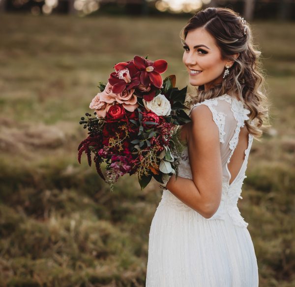 bride posing with bouquet