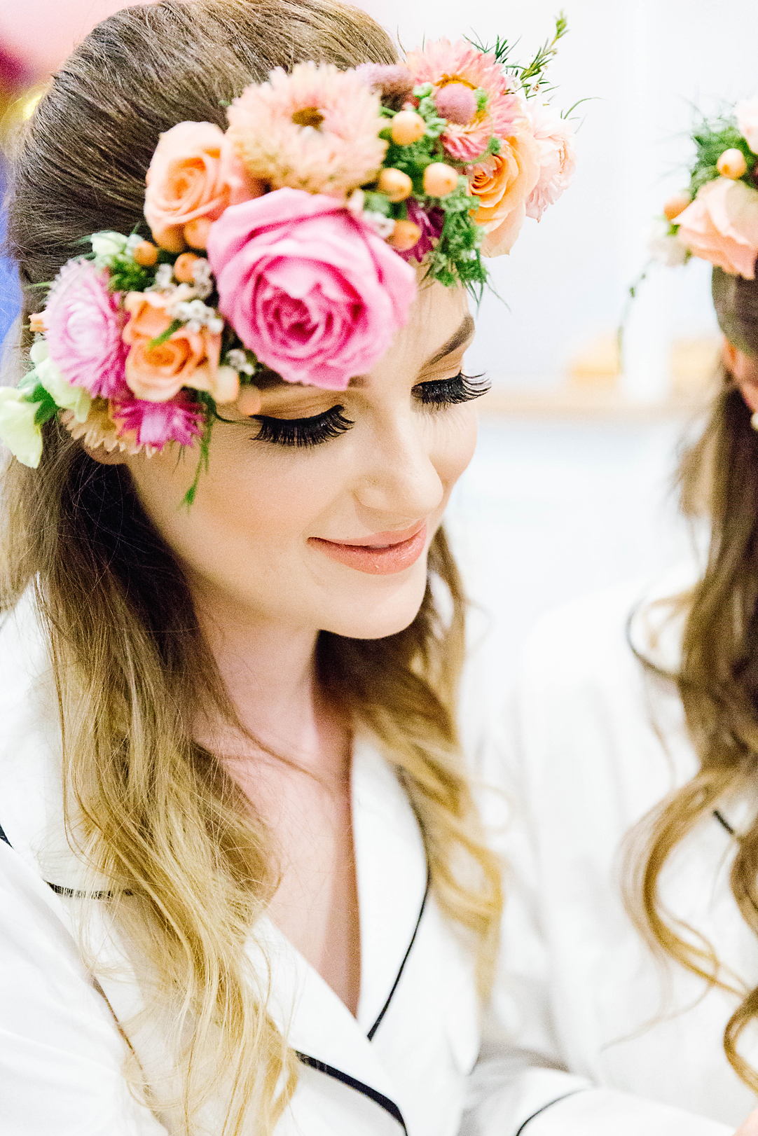 bridesmaid wearing a flower crown and matching pjs