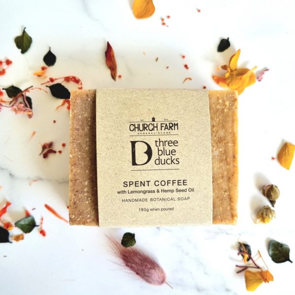 a spent coffee with lemongrass and hemp seed oil botanical soap bar displayed decoratively