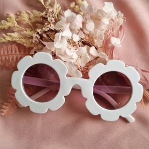 flower girl sunglasses are white plastic sunglasses in flower shape with purple/grey tinted lenses