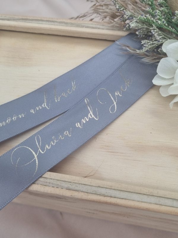 Olivia and Jack printed on gold on a bridal grey custom printed ribbon